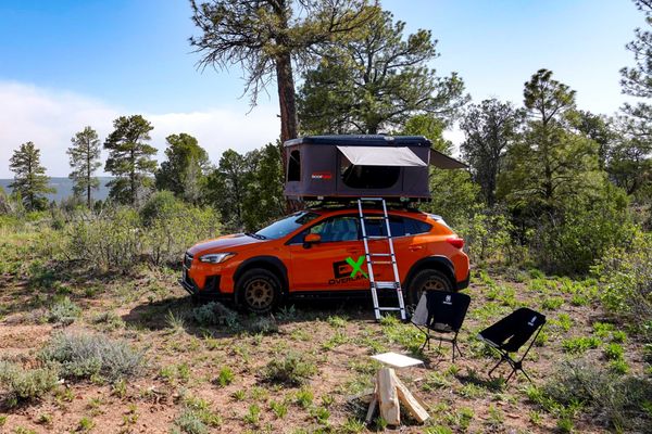 Subaru Crosstrek - Our Subaru Crosstrek is the most fuel efficient vehicle in the line up at 26 miles/gallon. If you like to travel light and rack up the miles, this is the one for you.
The Crosstrek is built to be sporty, and we have loaded it up for overland! A push of a button optimizes the vehicle for descending steep, slippery slopes. Once engaged, you can take your foot off the brake pedal and focus on steering down your intended path. Ours is loaded with t2″ Aventure lift kit, rock sliders, Aventure front bumper with skidplate and more. Camp setup with the Sparrow tent take just minutes. Get in, camp well and get out with our easiest to drive, set up, and tear down overland vehicle! Subaru Crosstrek - Our Subaru Crosstrek is the most fuel efficient vehicle in the line up at 26 miles/gallon. If you like to travel light and rack up the miles, this is the one for you.
The Crosstrek is built to be sporty, and we have loaded it up for overland! A push of a button optimizes the vehicle for descending steep, slippery slopes. Once engaged, you can take your foot off the brake pedal and focus on steering down your intended path. Ours is loaded with t2″ Aventure lift kit, rock sliders, Aventure front bumper with skidplate and more. Camp setup with the Sparrow tent take just minutes. Get in, camp well and get out with our easiest to drive, set up, and tear down overland vehicle!