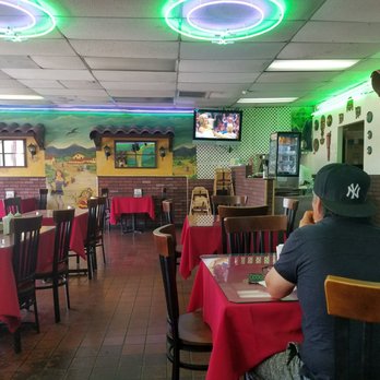 Parrilla's Cholito - Inside. TV was playing World Cup Soccer. - Peruvian Near Me - Downey, California
