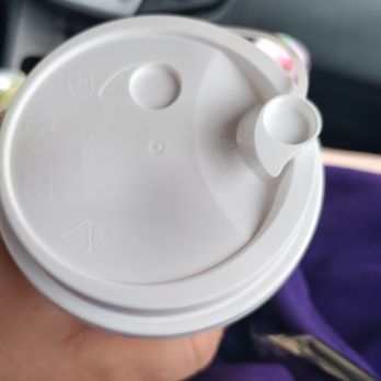 Fuya Kitchen - a person holding a cup of coffee - Asian Fusion Near Me - Conroe, Texas