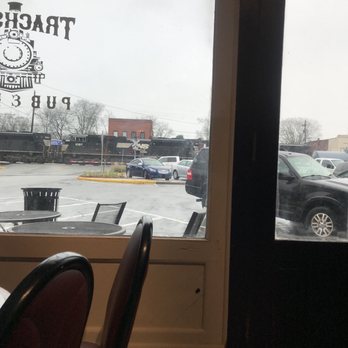 Trackside Pub & Deli - A look outside thru the main window at a Norfolk Southern train going past Trackside Pub & Deli - Salad Near Me - Tennille, Georgia Trackside Pub & Deli - A look outside thru the main window at a Norfolk Southern train going past Trackside Pub & Deli - Salad Near Me - Tennille, Georgia
