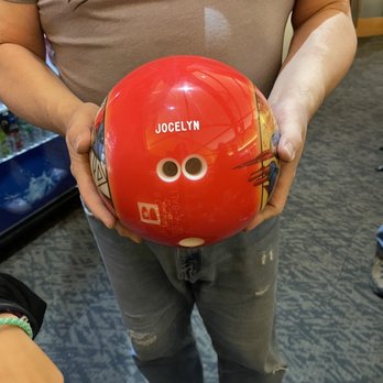 Habetler Bowl - Sang showing Jocelyn her newly drilled & inscribed Superman bowling ball - Bowling Near Me - Chicago, Illinois