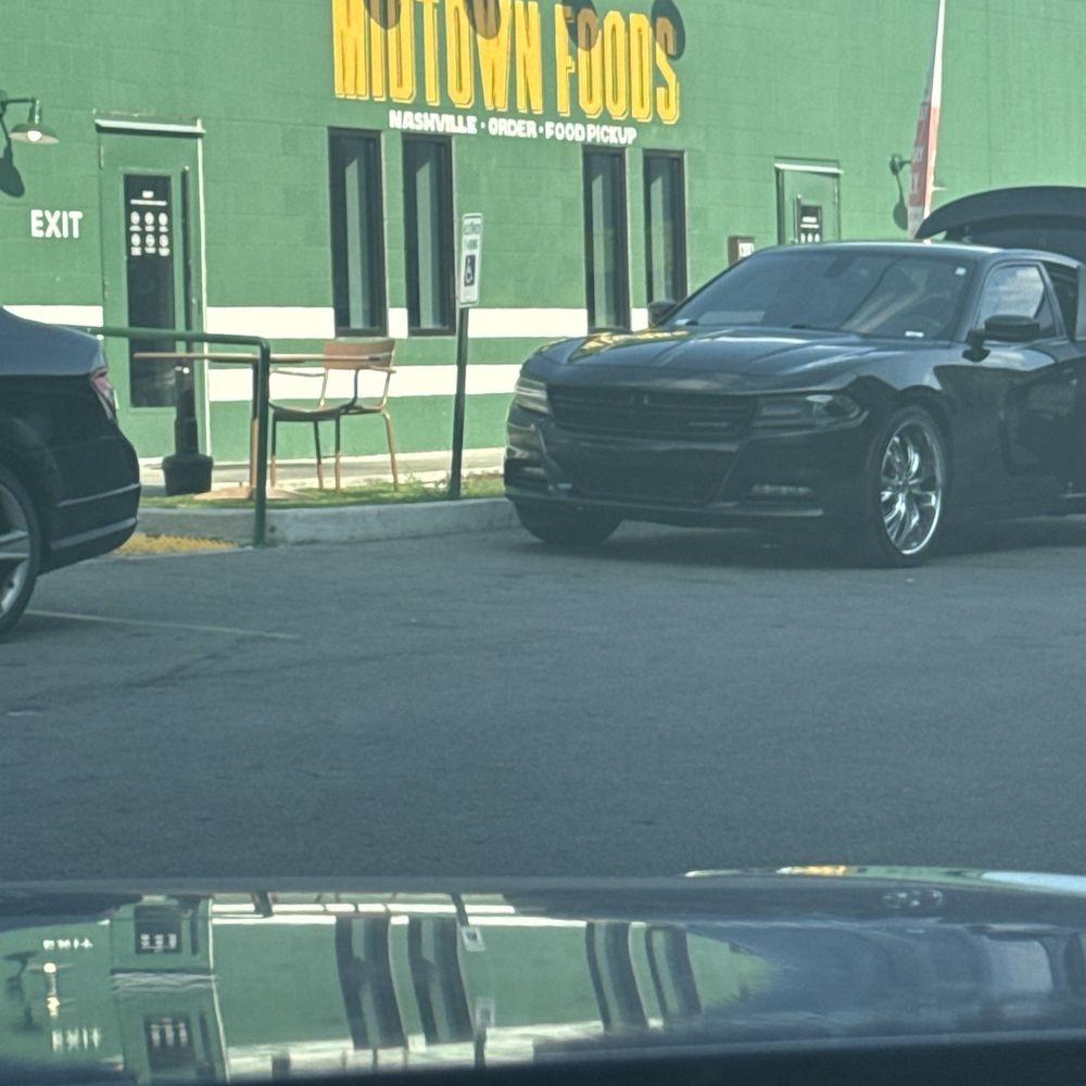 The restaurant is located directly on the street behind MLK High School. The restaurant is located directly on the street behind MLK High School.