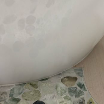 Elegant Kitchens & Bath - Didn't measure correctly AGAIN and left this gap where the rock tile is supposed to meet the tub. - General Contractors Near Me - Arcadia, California Elegant Kitchens & Bath - Didn't measure correctly AGAIN and left this gap where the rock tile is supposed to meet the tub. - General Contractors Near Me - Arcadia, California
