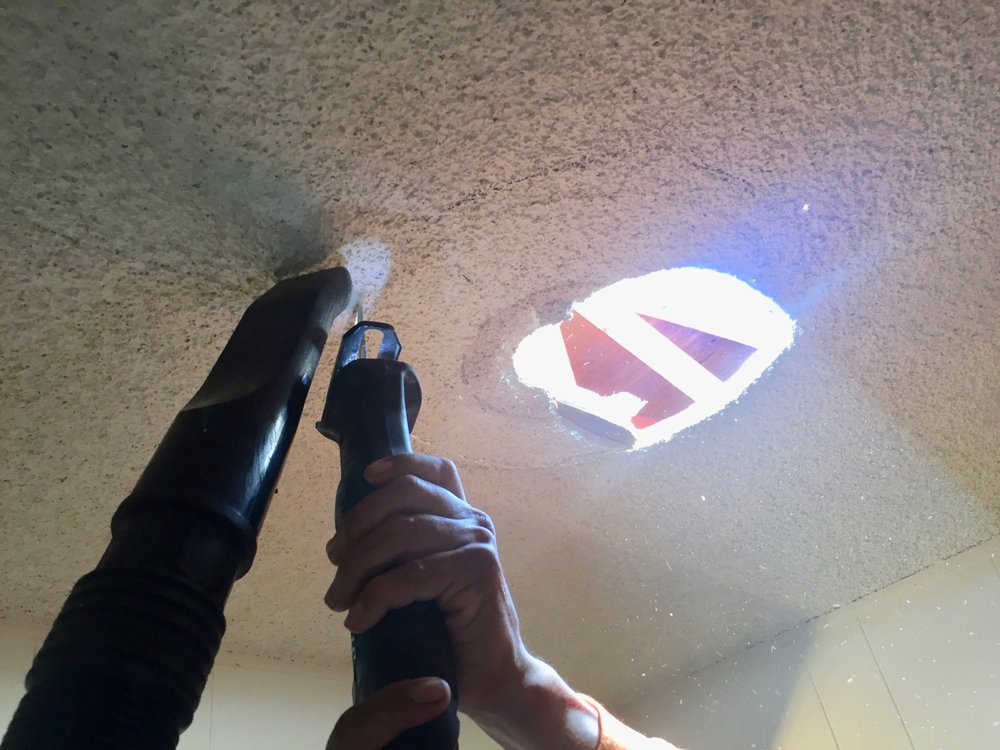 Slide of Economy Roofing