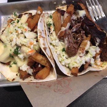 Blackie's - Brisket handheld taco. Sweet and savory. Good but very rich! - American Near Me - Smithfield, Rhode Island