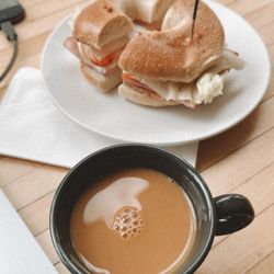 Crown Street Roasting Company - Simple cup of coffee with cream  & my fav bagel sandwich (Ham, apple, Gouda)