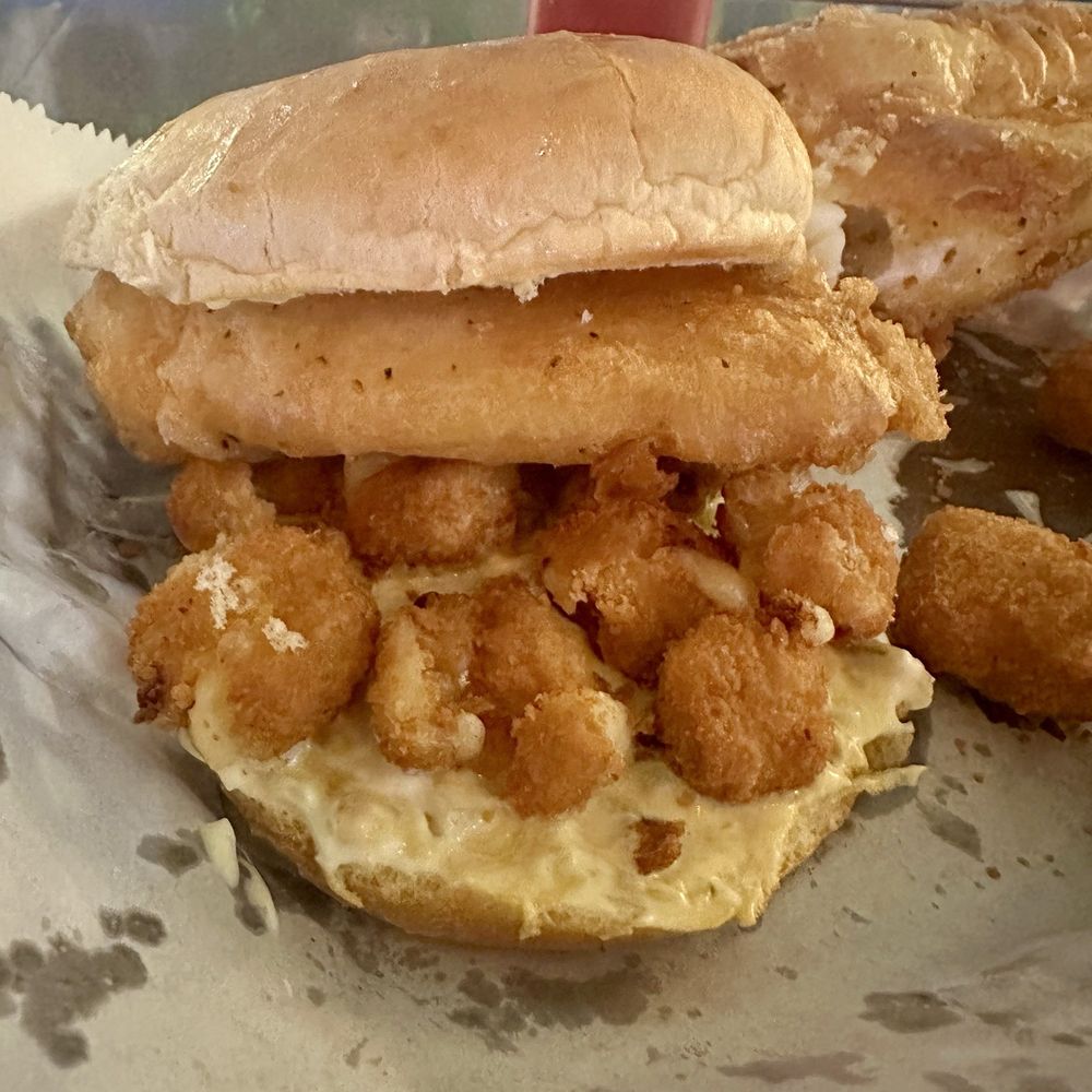 Lunker's - The Big Fish with pepper jack bites tartar and a little mustard on the bottom that is a great Sammie - American Near Me - Normal, Illinois Lunker's - The Big Fish with pepper jack bites tartar and a little mustard on the bottom that is a great Sammie - American Near Me - Normal, Illinois
