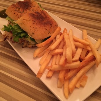 aMa Bistro - turkey and pesto panini with focaccia instead of french bread. tastes way better than it looks, so so so good! - Breakfast & Brunch Near Me - Ann Arbor, Michigan
