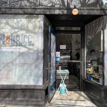 Maurice - Menu on window. Display of food in other window. - French Near Me - Portland, Oregon