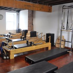 Symmetry Pilates Studio - Reformers and Towers for Group Sessions