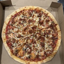 Large cheese pizza with bacon and mushrooms