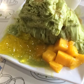 Nu Cafe - Green tea nu ice with caramel drizzle, fresh Mango, and lychee jelly - Ice Cream & Frozen Yogurt Near Me - Houston, Texas