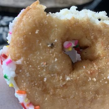 Christy's Donuts - a half eaten donut with sprinkles - Donuts Near Me - El Cajon, California