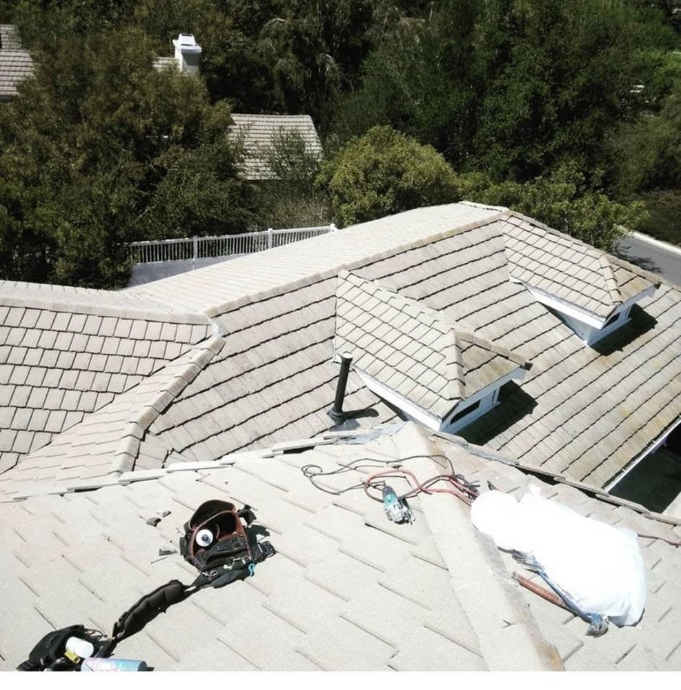 Slide of Baiza's Roofing