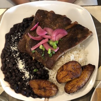 Ceviche's - Mojo ribs with coconut rice - Seafood Near Me - Wilmington, North Carolina Ceviche's - Mojo ribs with coconut rice - Seafood Near Me - Wilmington, North Carolina
