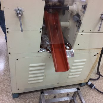 Le Caramel - The machine that wraps the wraps the caramels and spits them out - Candy Stores Near Me - El Cajon, California