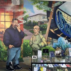 NugHub - They told me these were the owners of the store on the wall. Beautiful wall designs