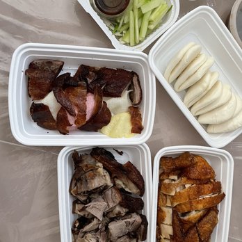 Pacific Palace - a variety of food in containers - Dim Sum Near Me - Brooklyn, New York Pacific Palace - a variety of food in containers - Dim Sum Near Me - Brooklyn, New York