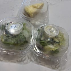 LaRocca's Pizza - Side salads with blue cheese dressing and a slice of lemoncello cake