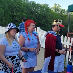 Severna Park Golf Center - Event in April 2023.  People dressed for Chick Fil-A, Wendy's, & Burger King