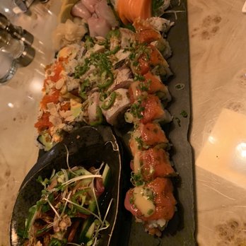The Sushi Bar at Next Door - White and red dragon roll. Lava roll. Sashimi. - Sushi Bars Near Me - Rochester, New York The Sushi Bar at Next Door - White and red dragon roll. Lava roll. Sashimi. - Sushi Bars Near Me - Rochester, New York