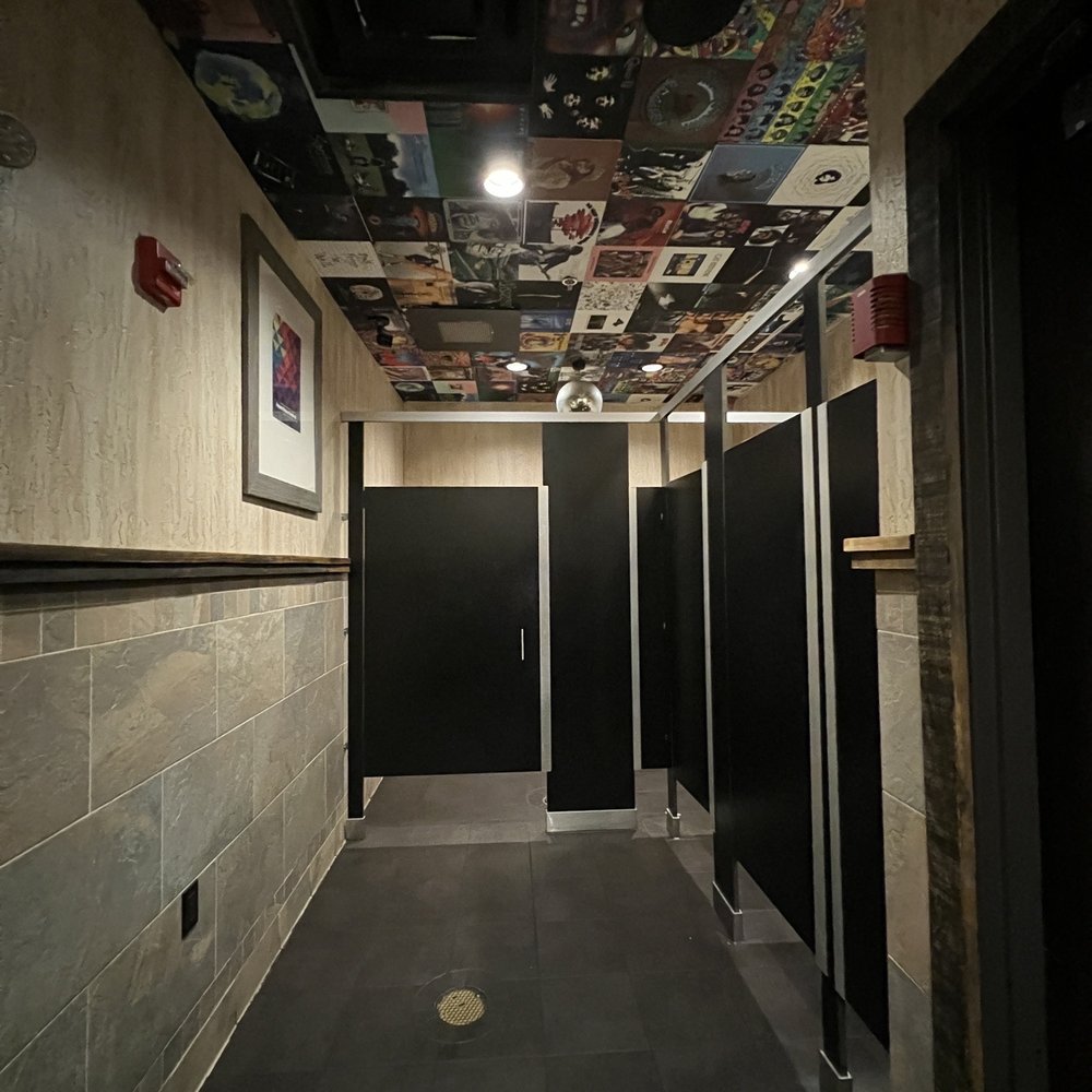 Aspen Creek Grill - Albums on the ceiling of the womens bathroom - Seafood Near Me - Amarillo, Texas
