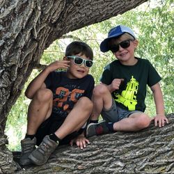 Calvin and Charlie, climbing a tree