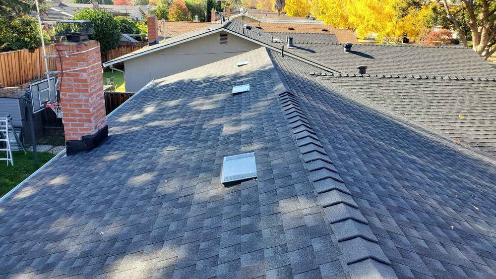 Slide of Trio Roofers