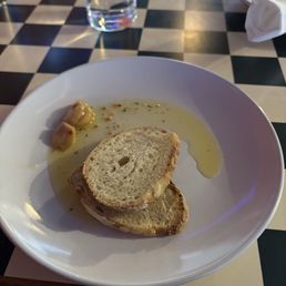 Confit garlic w toasted bread and olive oil
