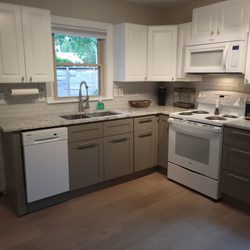 Cabinets To Go - Bottom gray cabinets.