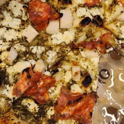 Pesto base with goat cheese & soppressata (after a slice or 2 was eaten)