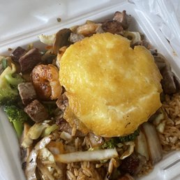 Steak and shrimp hibachi with egg yolk sauce