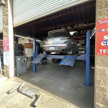 Canyon Muffler - Oem muffler being put back on 2012 Mazdaspeed 3 - Auto Repair Near Me - Canyon Cntry, California Canyon Muffler - Oem muffler being put back on 2012 Mazdaspeed 3 - Auto Repair Near Me - Canyon Cntry, California