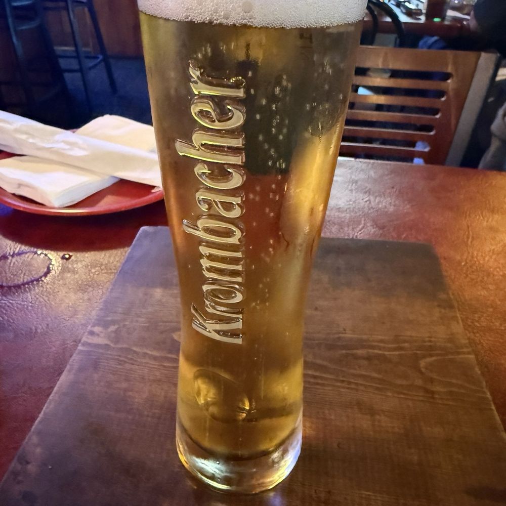 Pequod's Pizza - Krombacher Pilsner - Pizza Near Me - Morton Grove, Illinois Pequod's Pizza - Krombacher Pilsner - Pizza Near Me - Morton Grove, Illinois