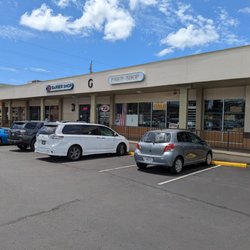 T's Barber Shop And Hairstyling - Bldg G, which is directly to the left upon entry into the main large parking lot of Waipahu Shopping Plaza.