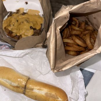 West Coast Cheesesteaks - West Coast Tots (top left), Onion Rings (top right), "The Classic" Cheesesteak (bottom) = ~$36 - Cheesesteaks Near Me - Glendora, California West Coast Cheesesteaks - West Coast Tots (top left), Onion Rings (top right), "The Classic" Cheesesteak (bottom) = ~$36 - Cheesesteaks Near Me - Glendora, California