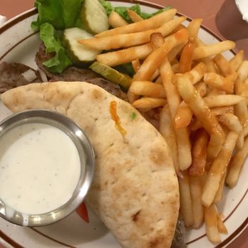 Coral Cafe - Gyros Sandwich. My boyfriends always licks this plate clean! He says it's "filling and delicious!" - American Near Me - Burbank, California