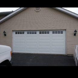 Exterior outside entrance of Excellence Garage Doors - Double steel insulated Garage door installed - Rockford, Illinois Exterior outside entrance of Excellence Garage Doors - Double steel insulated Garage door installed - Rockford, Illinois