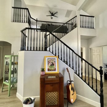 Jarvis Built - a guitar and a guitar stand in a living room - General Contractors Near Me - Buckeye, Arizona Jarvis Built - a guitar and a guitar stand in a living room - General Contractors Near Me - Buckeye, Arizona
