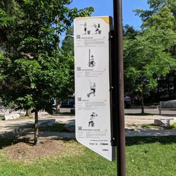Cedarvale Park - One of the signs on how to use the workout equipment in the part of the park outside St Clair West Station Heath-Tichester Exit. July 2019