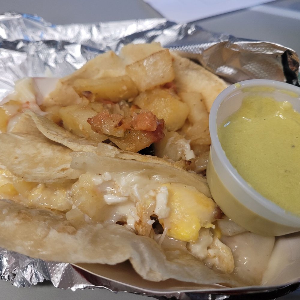 Potato and egg with cheese, and papa a la mexicana Potato and egg with cheese, and papa a la mexicana
