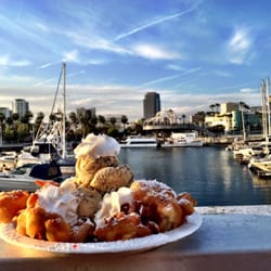 The Funnel House - Funnel Cake Sundae with strawberry topping and Oreo ice cream... Amazing!