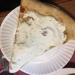 Cousin's Pizza - White pizza - the cheese was smothered on the pizza like cream cheese on a bagel. Simply delicious!