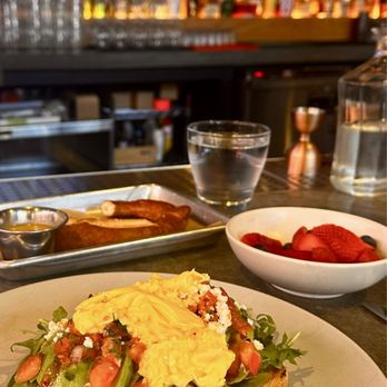 The Garden - Avocado toast, egg, fruit & pretzel - w Dancing Queen in the background - Beer Gardens Near Me - Napa, California The Garden - Avocado toast, egg, fruit & pretzel - w Dancing Queen in the background - Beer Gardens Near Me - Napa, California