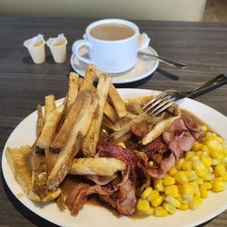 Mellos Coffee Shop - Baby beef liver with onions, gravy, bacon & home cut fries. Less than $10.