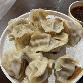 Dumpling Factory - Pan fried dumpling after I flip over for a nicer shot - Chinese Near Me - Honolulu, Hawaii Dumpling Factory - Pan fried dumpling after I flip over for a nicer shot - Chinese Near Me - Honolulu, Hawaii
