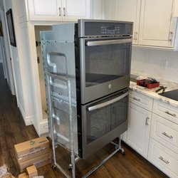 Home Appliance Service and Repair - Double oven, pulled out from wall with an alldolly.