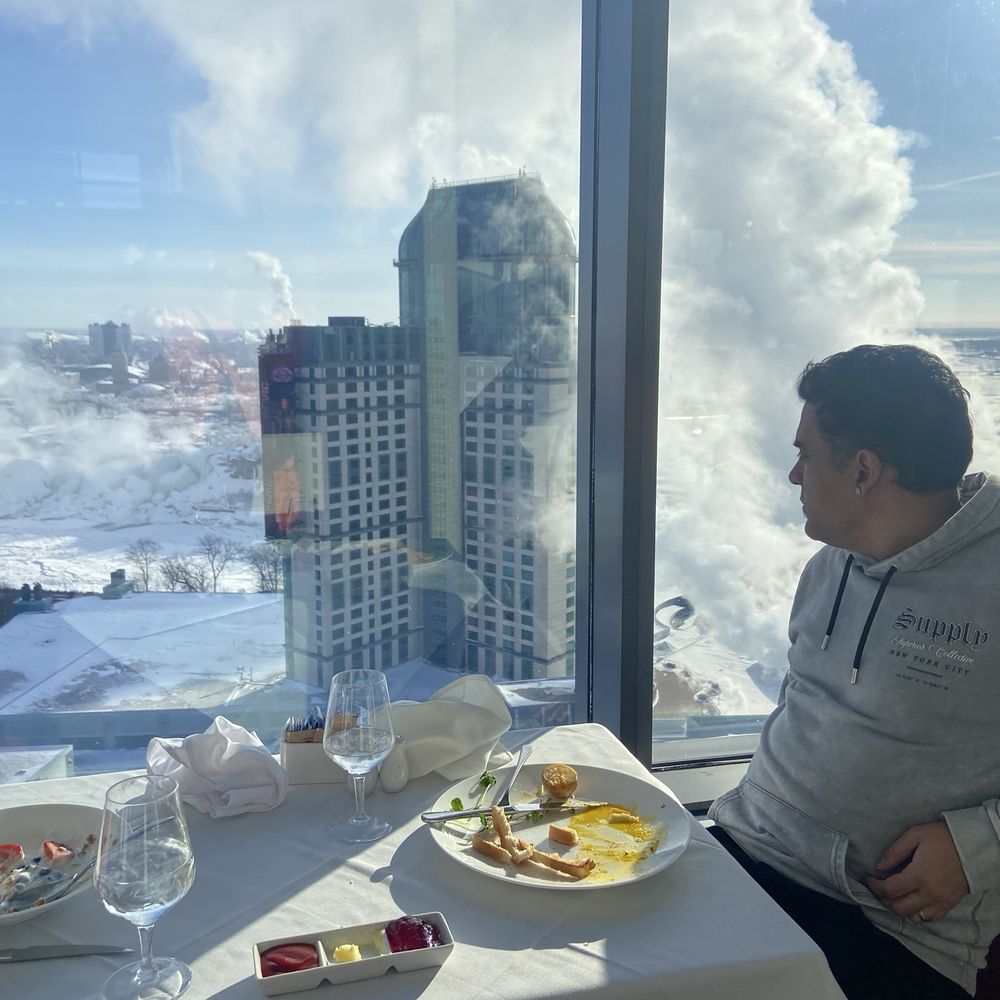 Watermark Fallsview Dining - My man gazing out - Canadian (New) Near Me - Niagara Falls, Ontario Watermark Fallsview Dining - My man gazing out - Canadian (New) Near Me - Niagara Falls, Ontario