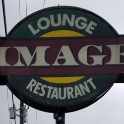Image - This is the sign out front of the building for the business.