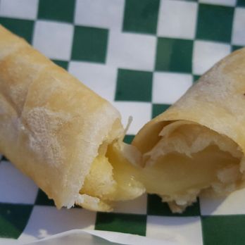 Mr. Cooker - Tequeño, broken in half to show off cheese. I would've liked more crunch, but the cheese didn't disappoint. - Venezuelan Near Me Mr. Cooker - Tequeño, broken in half to show off cheese. I would've liked more crunch, but the cheese didn't disappoint. - Venezuelan Near Me